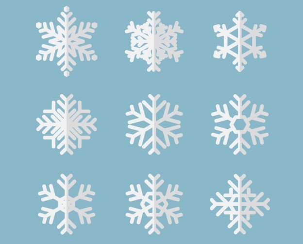 Simple, snowflake decorations made with your housemates are cheap and effective.